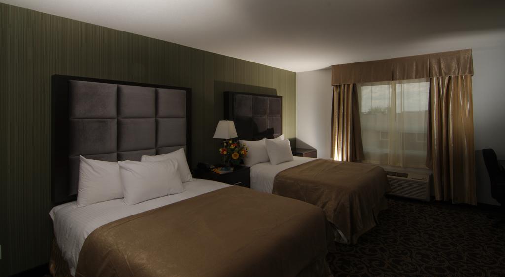 Paradise Inn And Suites Redwater Quarto foto