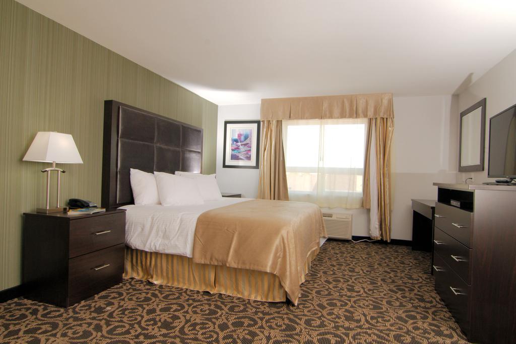 Paradise Inn And Suites Redwater Quarto foto